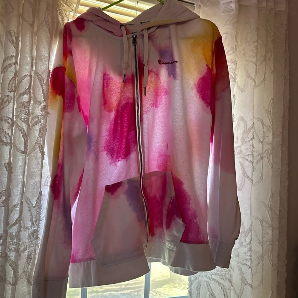 Zip up, tie dye champion hoodie.